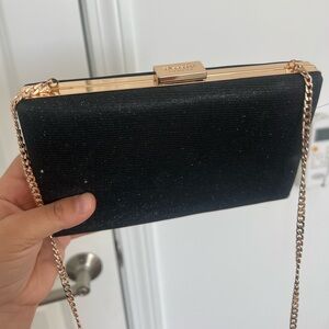 Glamorous black clutch bag with gold chain #partybag #goingout